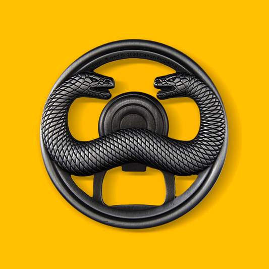 Thulsa Doom Bottle Opener - Anvil Black on a yellow background