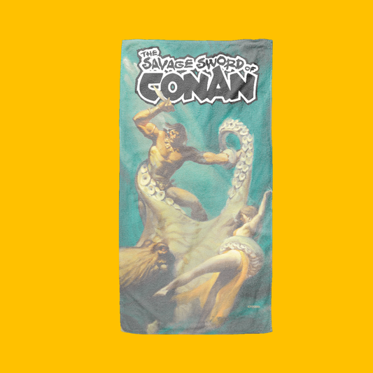 Conan - Savage Sword of Conan The Thing Below Beach Towel on Heroic Signatures yellow background