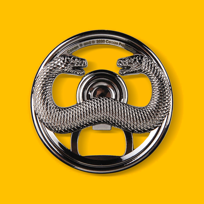 Thulsa Doom Bottle Opener -Chrome on a yellow background