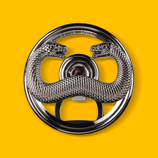 Thulsa Doom Bottle Opener -Chrome on a yellow background
